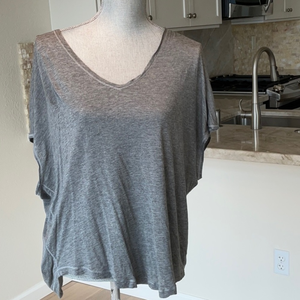 Lululemon t-shirt size M Gray. Short sleeve with v-back.  Read description